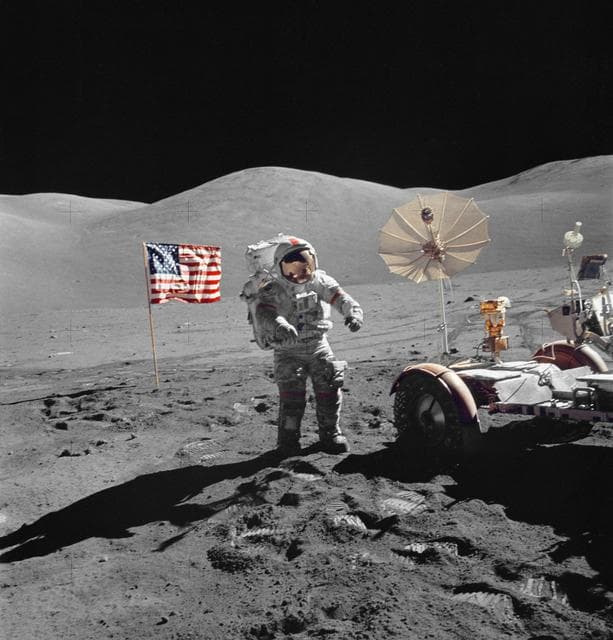 Astronaut Eugene Cernan walks toward LRV during EVA
