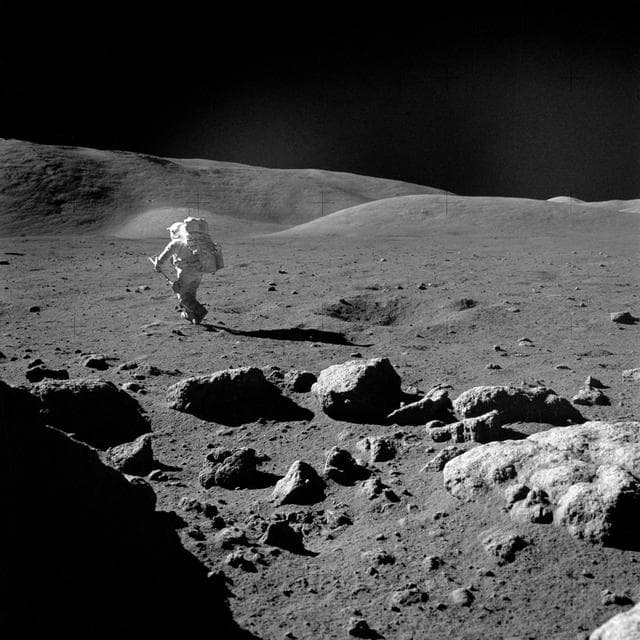 NASA image: Astronaut Harrison Schmitt retrieving lunar samples during EVA