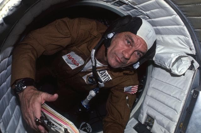 NASA image: Astronaut Donald Slayton in hatchway between Apollo and Soyuz spacecraft