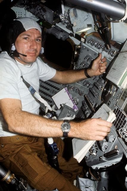 NASA image: Astronaut Vance Brand at controls of Apollo Command Module