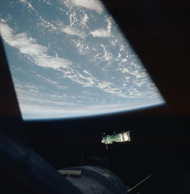 NASA image: Soviet Soyuz spacecraft contrasted against a black-sky background
