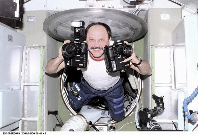 NASA image: Usachev with cameras in Service Module