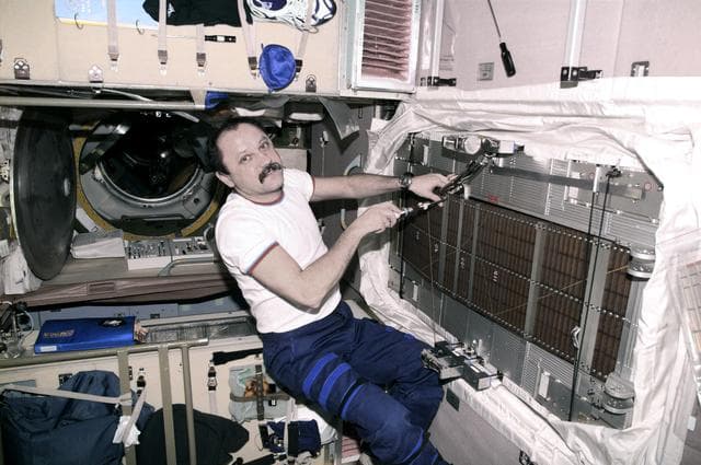 NASA image: Usachev performs maintenance on TVIS system in Service module