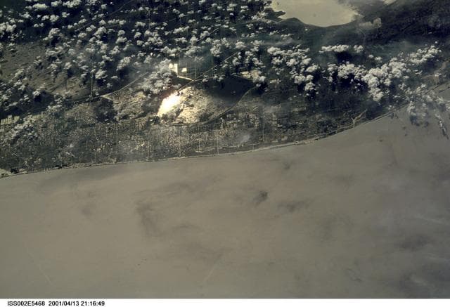 NASA image: Sunglint on Miami taken by the Expedition Two crew