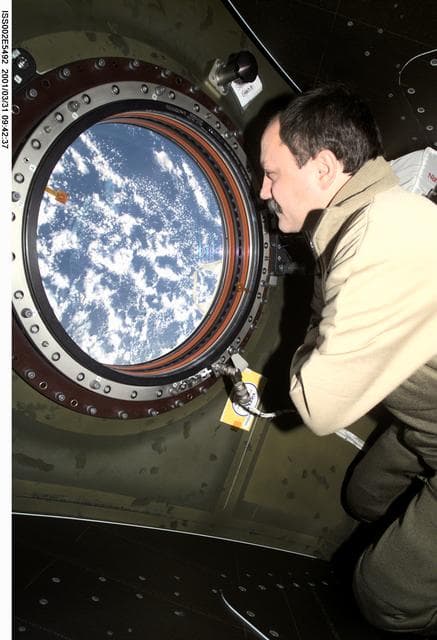 NASA image: View of Usachev at photo quality window in Destiny Laboratory module