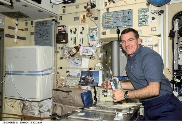 NASA image: Voss with coffee and snack in Service Module