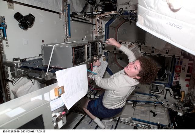 NASA image: Helms in Destiny laboratory with rack