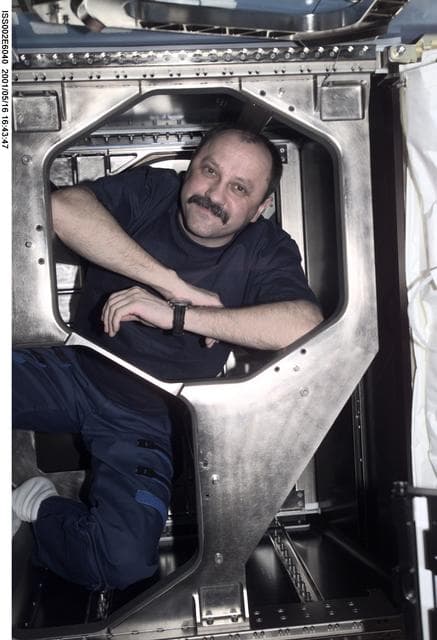 NASA image: Usachev behind panel in Destiny laboratory