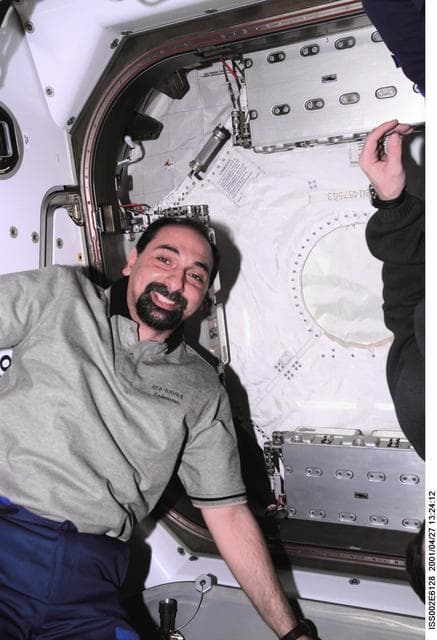 NASA image: Guidoni in front of Node 1/Unity hatch