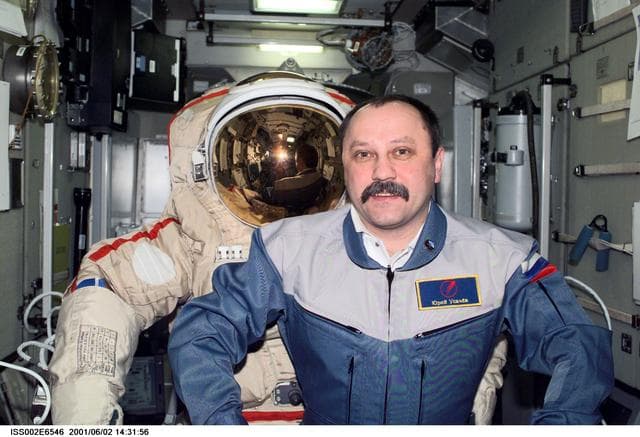 NASA image: Usachev with Orlan suit in Zvezda Service module