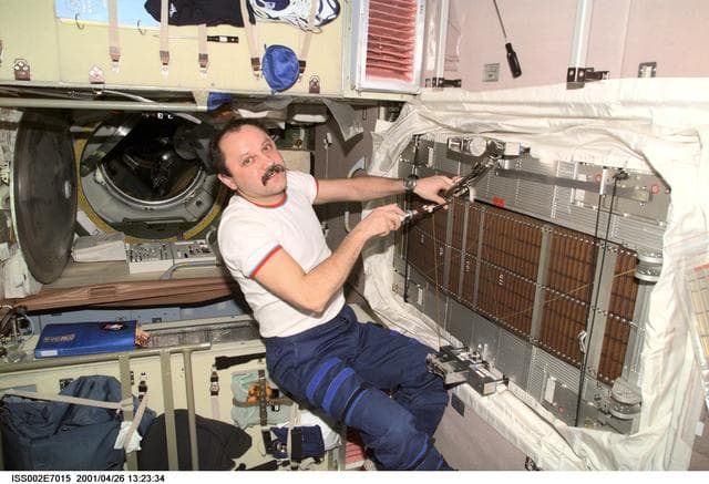 NASA image: Usachev performs maintenance on TVIS in Zvezda module