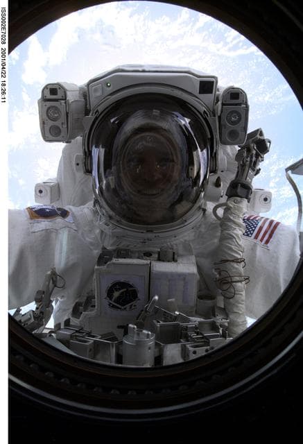 NASA image: View of STS-100 MS Parazynski during EVA 1 at Destiny laboratory window