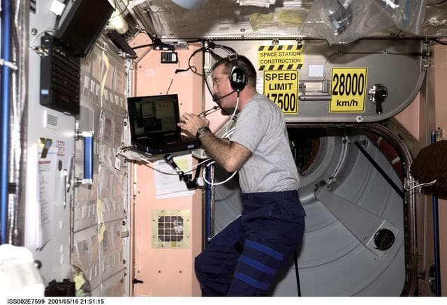 NASA image: Voss in Destiny with laptop
