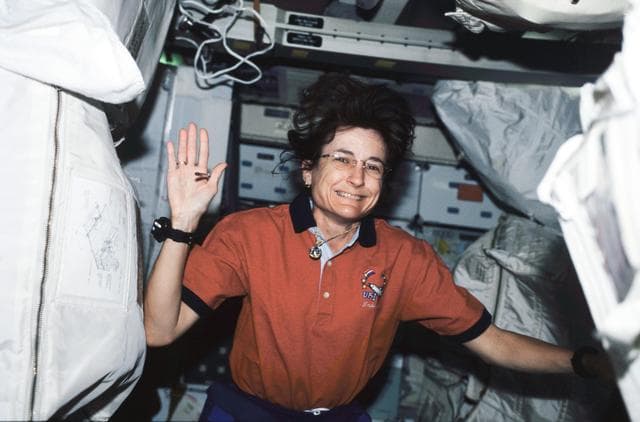 NASA image: MS Godwin works on stowage transfer during STS-108's visit