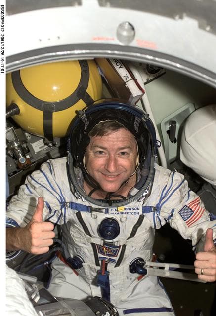 NASA image: Frank Culbertson poses in the Soyuz Spacecraft during Expedition Three