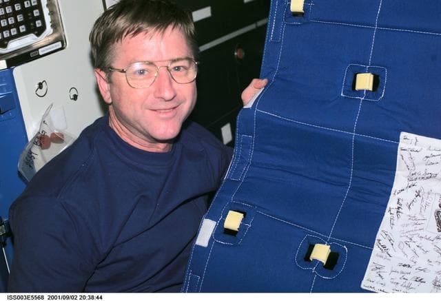 NASA image: Culbertson sets up the Temporary Sleep Station (TESS) in Destiny during Expedition Three