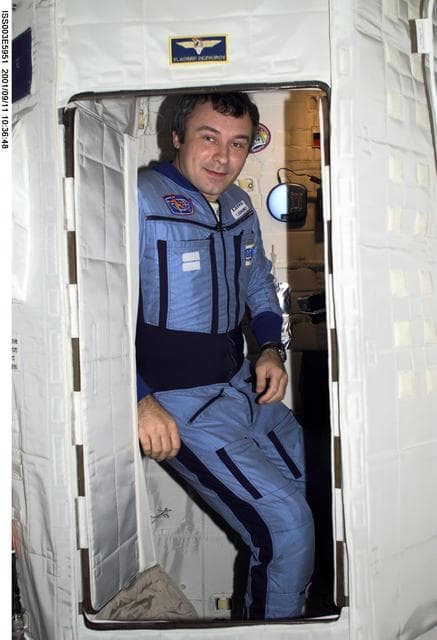 NASA image: Dezhurov pose in the TESS in the U.S. Laboratory during Expedition Three