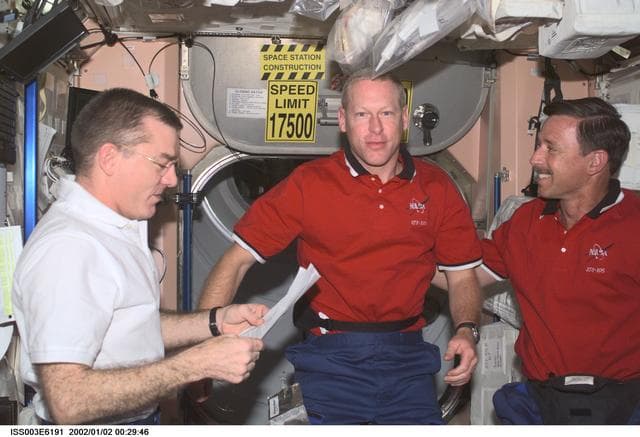 NASA image: Forrester is presented with a medal by Voss and Horowitz in Node 1
