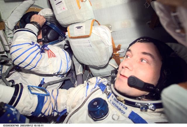 NASA image: Dezhurov and Culbertson in the Soyuz spacecraft during Expedition Three