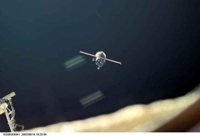 NASA image: View of the approach of the Soyuz carrying the Taxi crew taken during Expedition Three