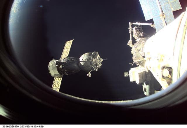 NASA image: View of the approach of the Soyuz carrying the Taxi crew taken during Expedition Three