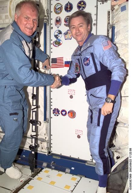 NASA image: Afanasyev and Culbertson pose in Node 1 during Expedition Three