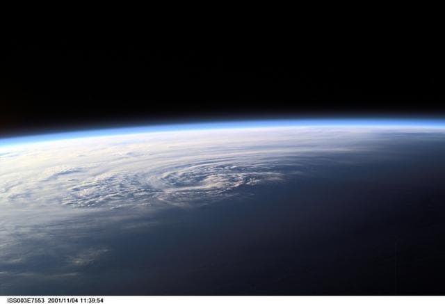 NASA image: Earth observations of a sunrise / sunset taken during the Expedition Three mission