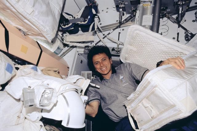 NASA image: Chang-Diaz works with EVA equipment in Node 1 during STS-111 UF-2 / Expedition Four