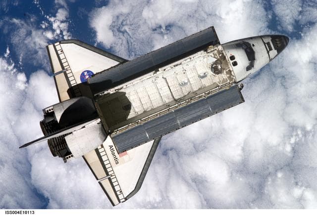 NASA image: STS-110 Shuttle Atlantis separates from the ISS following undocking, Expedition Four