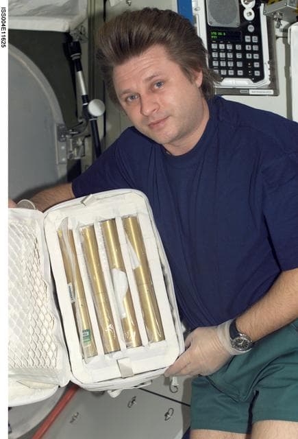 NASA image: Onufrienko holds Autoclaves for the ZCG in the U.S. Lab during Expedition Four