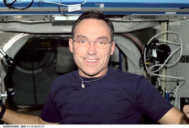 NASA image: Carl Walz smiles for the camera in the U.S. Laboratory during Expedition Four