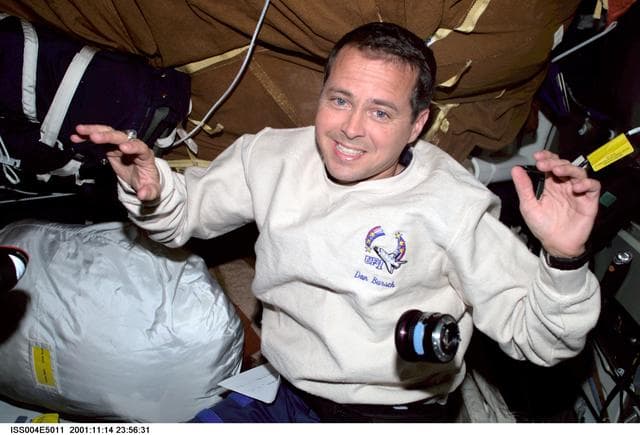 NASA image: Dan Bursch smiles for the camera from the middeck during Expedition Four