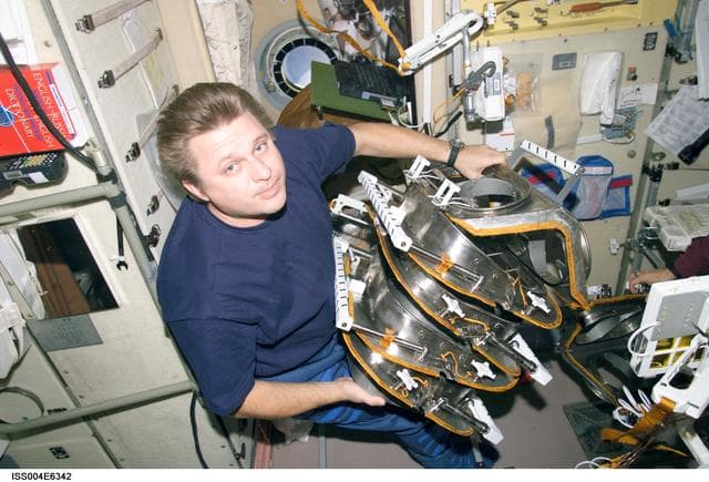 NASA image: Onufrienko configures hardware in the SM for EVA 2,  Expedition Four