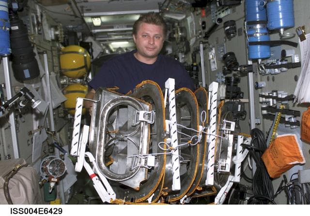 NASA image: Onufrienko with thruster exhaust plume deflectors in the SM taken Expedition Four