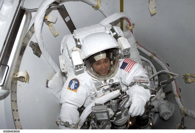 NASA image: Bursch and Walz in Quest Airlock for EVA 3, Expedition Four