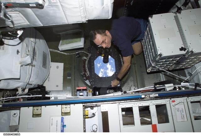 NASA image: Walz takes Earth OBS photos from U.S. Laboratory window during Expedition Four