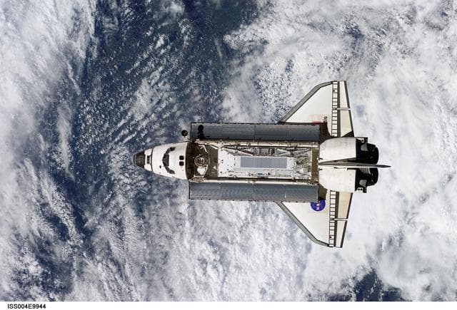 NASA image: Shuttle Atlantis on approach for docking to the ISS during STS-110 and Expedition Four