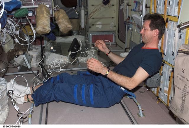 NASA image: Expedition Five Flight Engineer Sergei Treschev with SPRUT Experiment