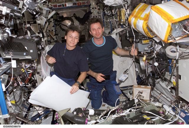 NASA image: Whitton and Treschev pose for image in the U.S. Laboratory during Expedition Five
