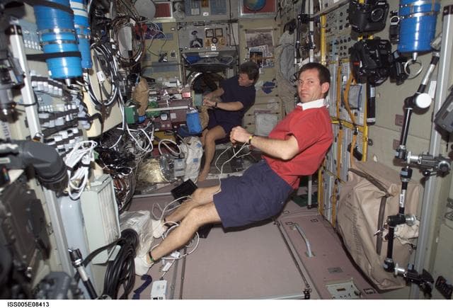 NASA image: Treschev and Whitson in the Service Module taken during Expedition Five on the ISS