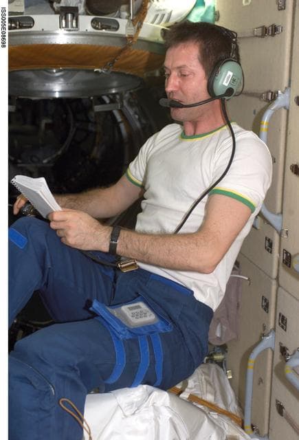 NASA image: Treschev, Expedition Five flight engineer, uses an amateur radio in FGB