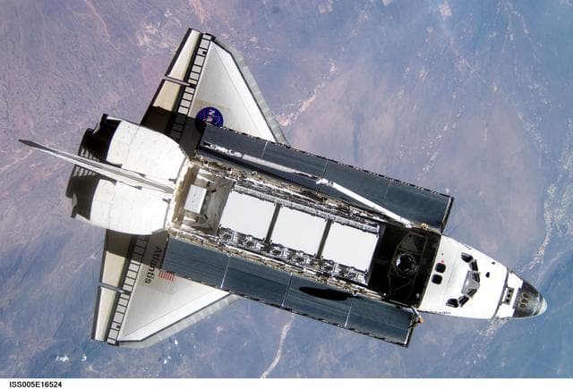 NASA image: Atlantis during STS-112 approach to ISS during Expedition Five