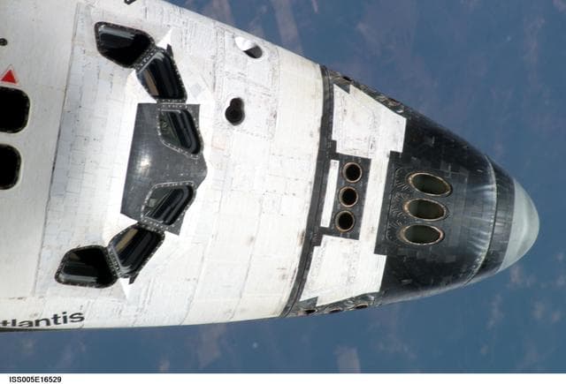 NASA image: Atlantis during STS-112 approach to ISS during Expedition Five