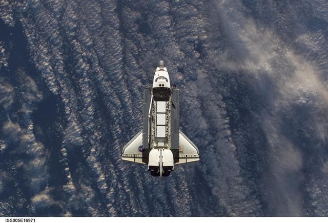 NASA image: Atlantis during STS-112 approach to ISS during Expedition Five