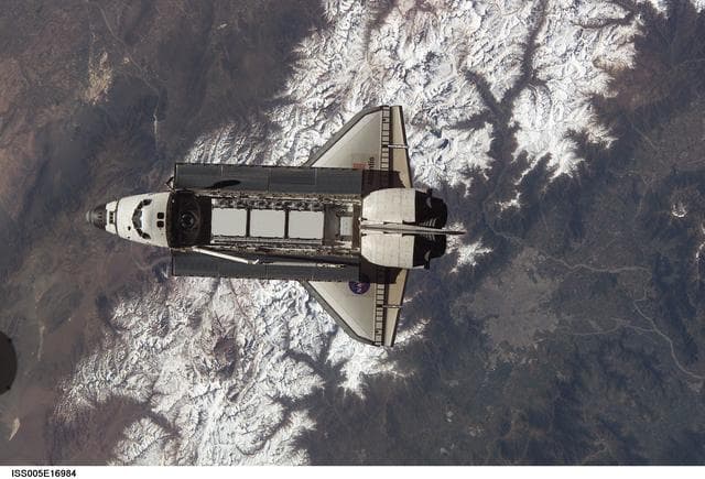 NASA image: Atlantis during STS-112 approach to ISS during Expedition Five