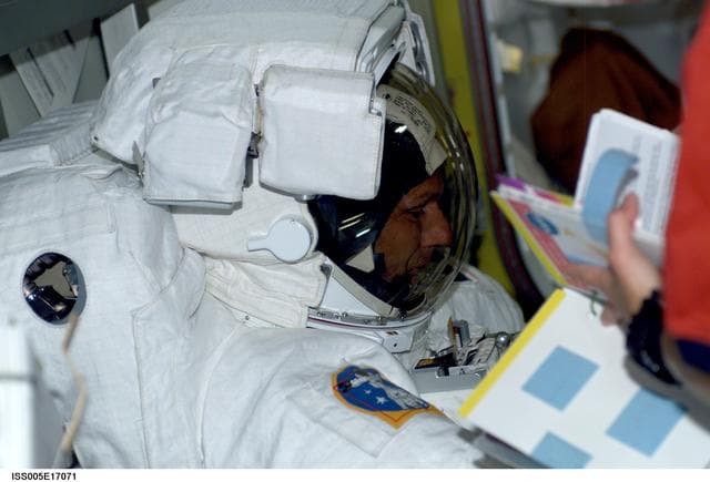 NASA image: Sellers attired in his EMU during Expedition Five on the ISS