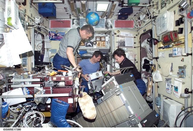 NASA image: Expedition Five crew perform maintenance on the TVIS
