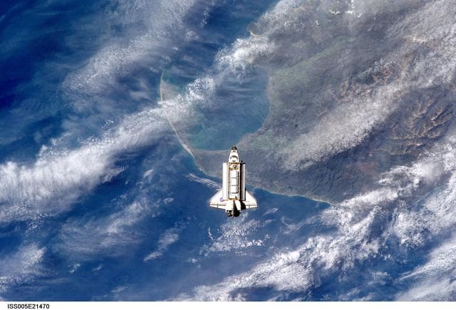 NASA image: Endeavor during STS-113 approach to ISS during Expedition Five