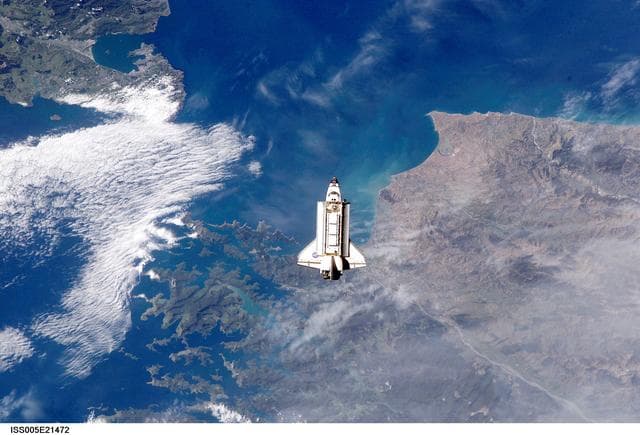 NASA image: Endeavor during STS-113 approach to ISS during Expedition Five