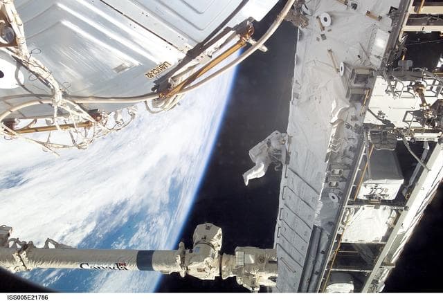 NASA image: STS-113 astronaut working on P1 truss on the ISS during EVA
